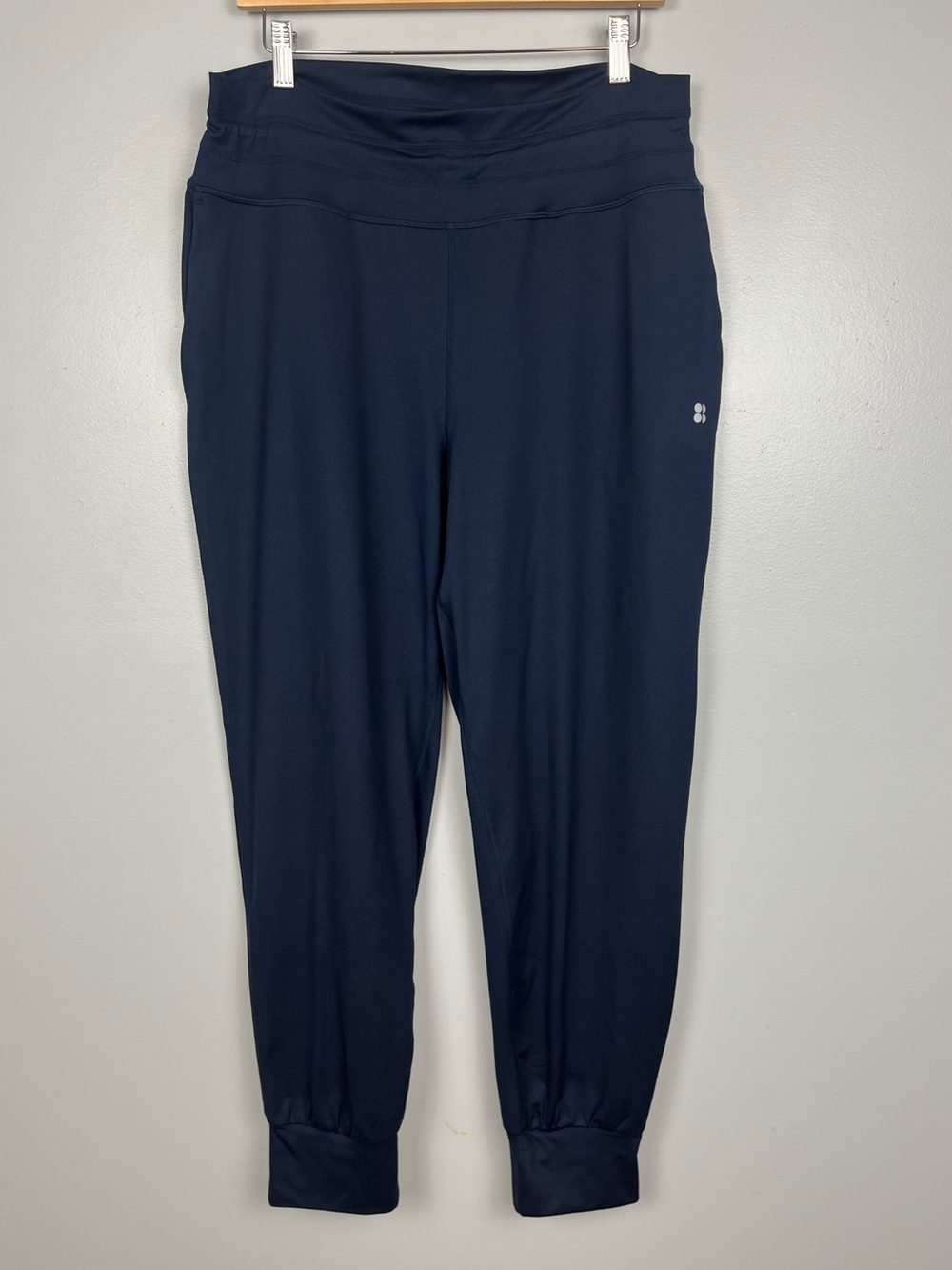 Sweaty Betty navy blue pull on jogger style pants, large.